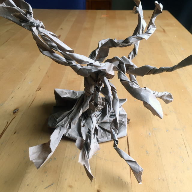plastic bag twisted into a bonsai tree